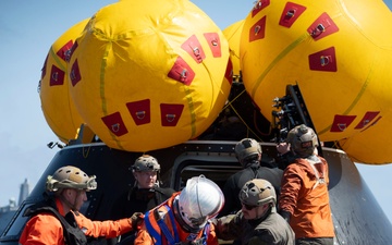 Sailors and NASA Astronauts conduct recovery drills for URT-12