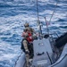 U.S. Coast Guard conducts small boat operations with U.S. Navy Sailors