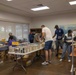 Navy Volunteers Help Aiea Public Library Organize Books for Annual Book Sale