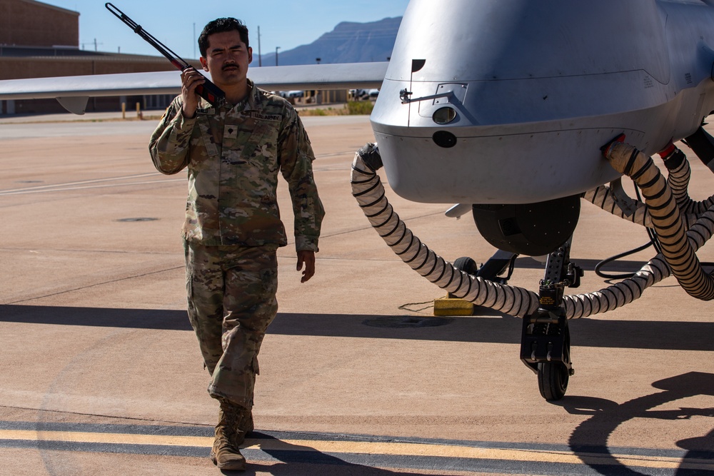 3rd CAB Soldiers prepare Gray Eagle for takeoff in Arizona