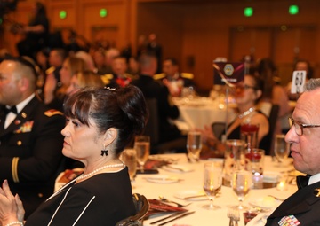 Service Members and their families gather for Service Member and Employee of the Year Banquet