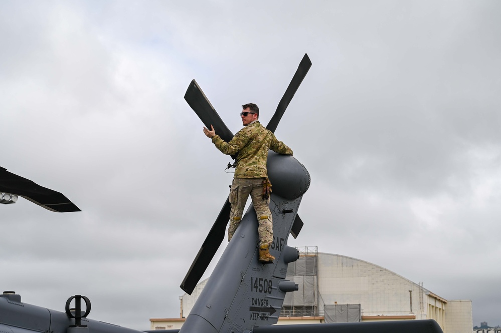 Training in three’s: 353 SOW, 33 RQS, HMLA 267