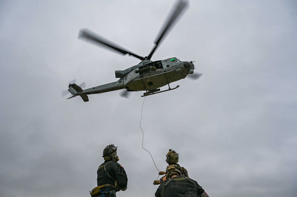 Training in three’s: 353 SOW, 33 RQS, HMLA 267