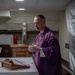 Cmdr. Ben Garrett leads Ash Wednesday services aboard the USS George Washington (CVN 73)