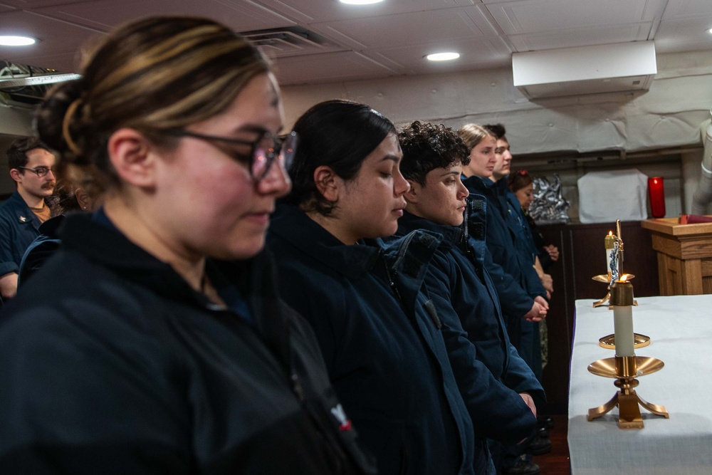 Cmdr. Ben Garrett leads Ash Wednesday services aboard the USS George Washington (CVN 73)