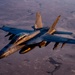 CENTCOM KC-135 Stratotanker conducts nighttime aerial refueling with F/A-18 Super Hornets