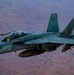CENTCOM KC-135 Stratotanker conducts nighttime aerial refueling with F/A-18 Super Hornets