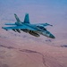 CENTCOM KC-135 Stratotanker conducts nighttime aerial refueling with F/A-18 Super Hornets