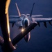 CENTCOM KC-135 Stratotanker conducts nighttime aerial refueling with F/A-18 Super Hornets