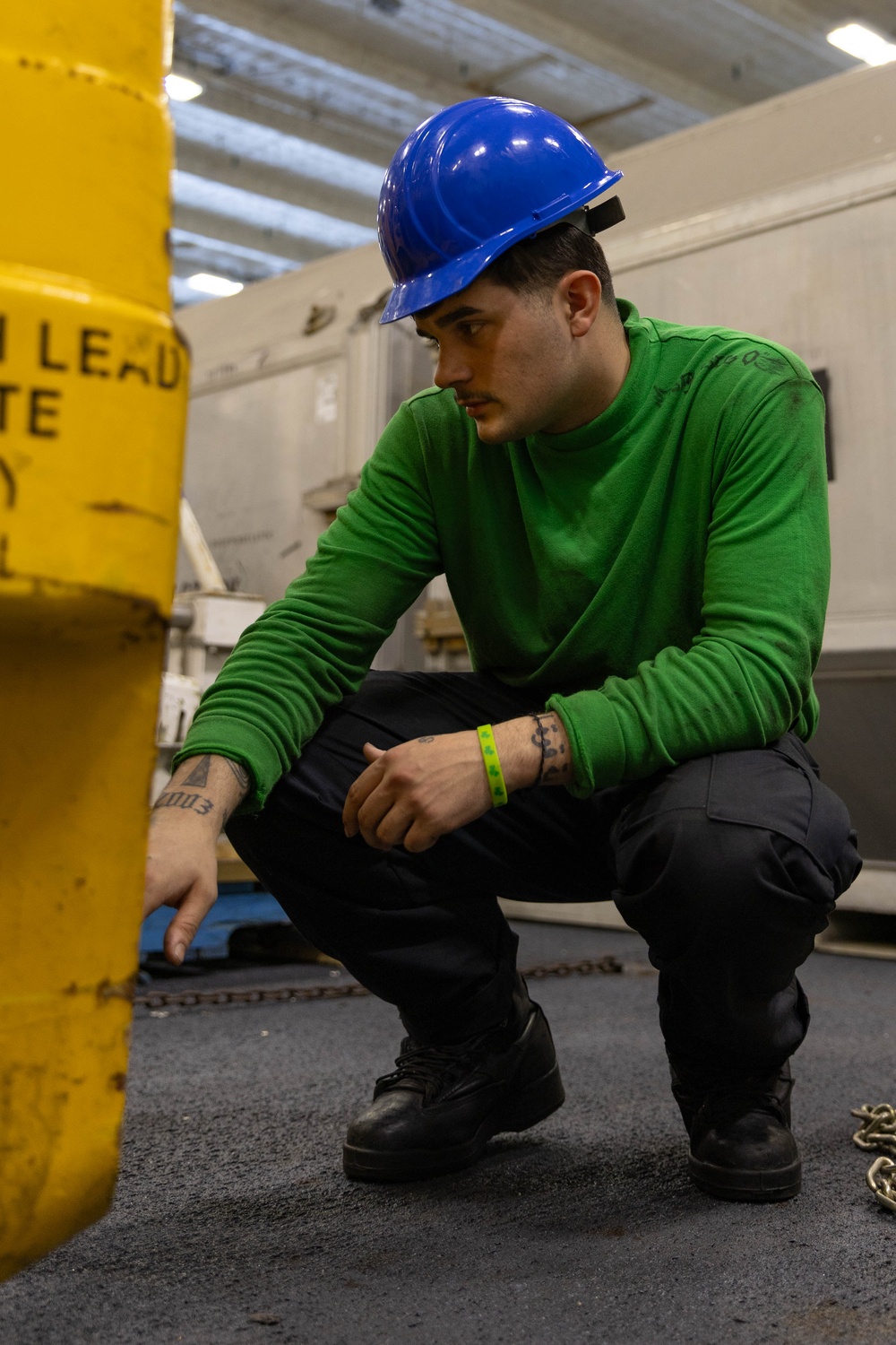 Sailor Conducts routine maintenance