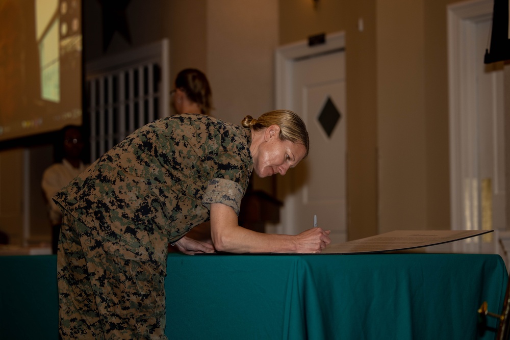 Quantico Base Leadership and SAPR personnel sign 2025 SAAPM Proclamation