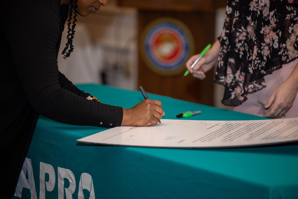 Quantico Base Leadership and SAPR personnel sign 2025 SAAPM Proclamation