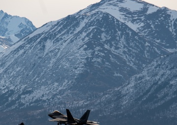 F-22 Raptors conduct aerial practices at JBER