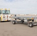 MAG-11 Marines load weapons and equipment using Marine adjustable cargo trailer