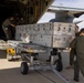 MAG-11 Marines load weapons and equipment using Marine adjustable cargo trailer
