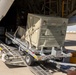 MAG-11 Marines load weapons and equipment using Marine adjustable cargo trailer