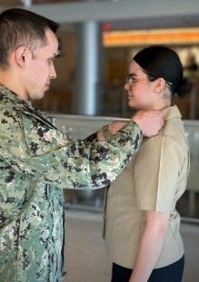 Navy Hospital Corpsmen assigned to Navy Medicine and Readiness Training Command-Fort Belvoir get pinned to Petty Officer Third Class.