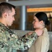 Navy Hospital Corpsmen assigned to Navy Medicine and Readiness Training Command-Fort Belvoir get pinned to Petty Officer Third Class.