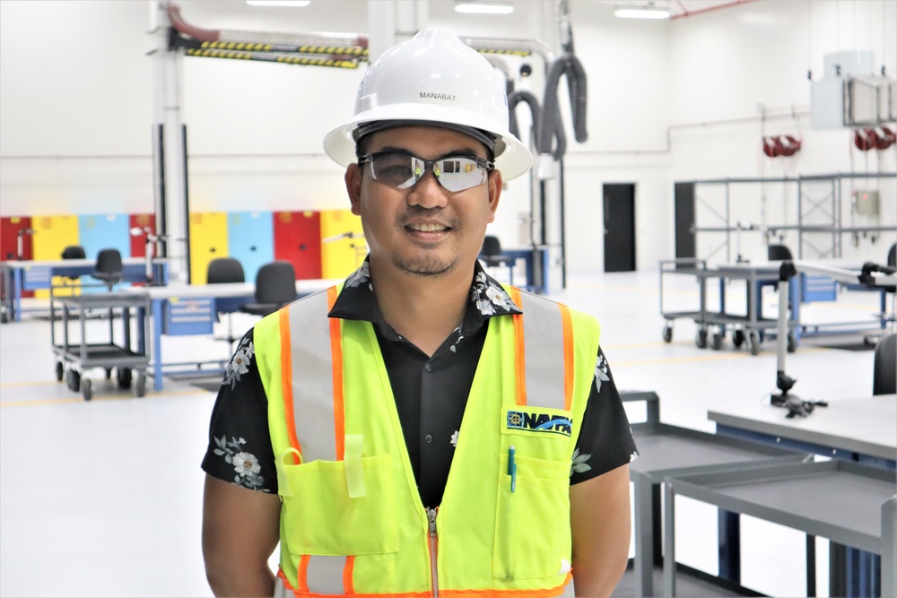 An Engineering Technician Poses in the Auto Shop Project He Oversees on Camp Blaz
