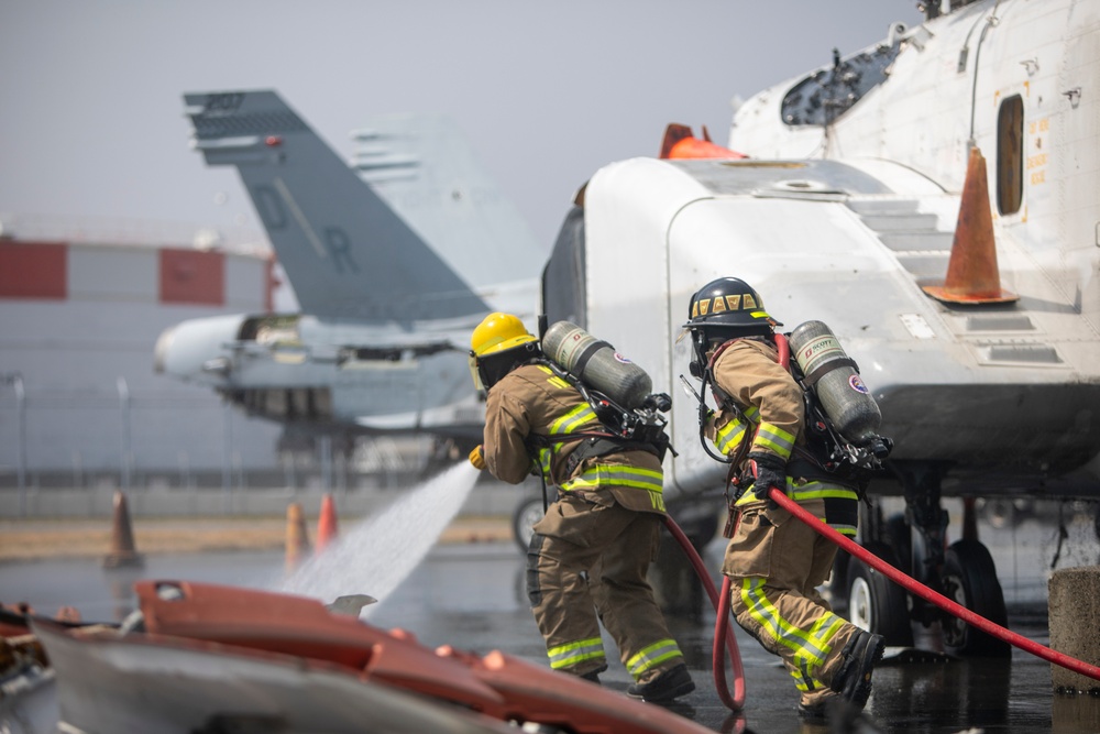 ARFF Marines and U.S. Airmen conduct mass casualty training at MCAS Iwakuni