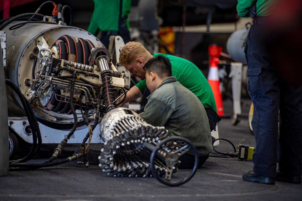 Nimitz Sailors Perform Maintenance on a Refueling System