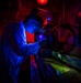 Nimitz Sailor Utilizes a Magnetic Particle Bench to Test Parts