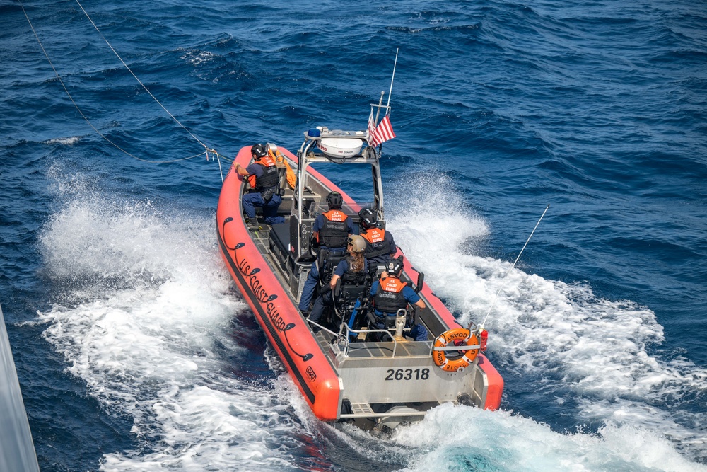 U.S. Coast Guard Cutter Kimball conducts small boat pursuit training and flight operations