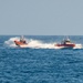 U.S. Coast Guard Cutter Kimball conducts small boat pursuit training and flight operations