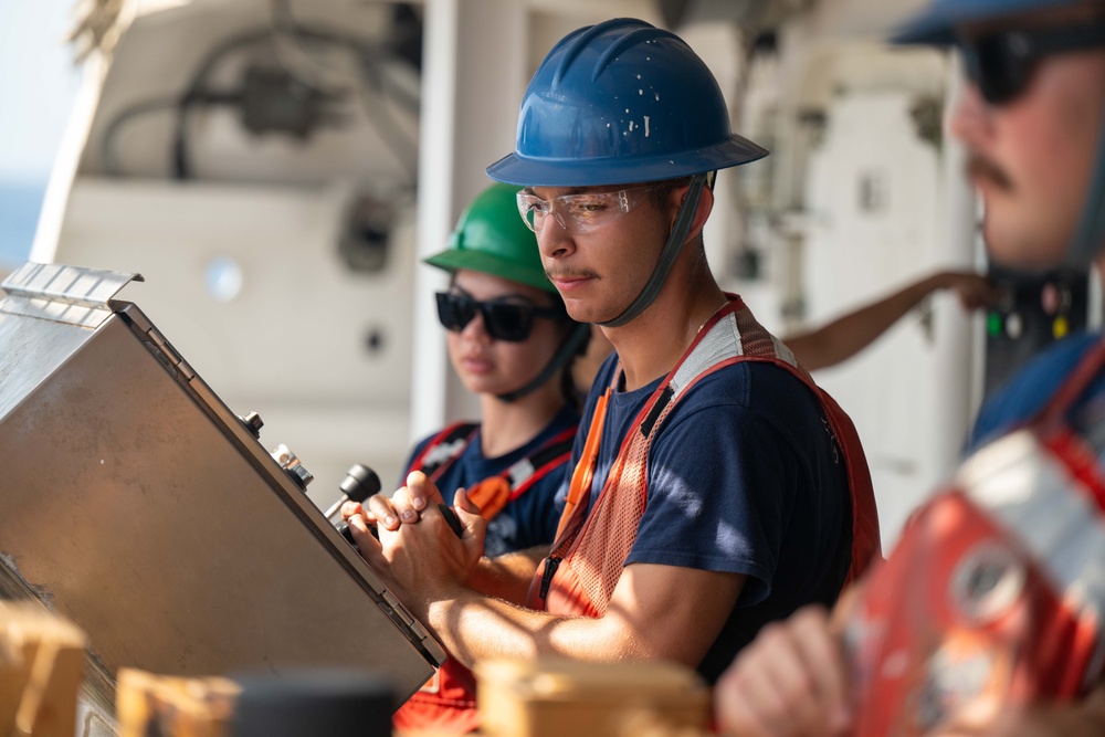 U.S. Coast Guard Cutter Kimball conducts small boat pursuit training and flight operations