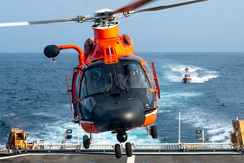 U.S. Coast Guard Cutter Kimball conducts small boat pursuit training and flight operations