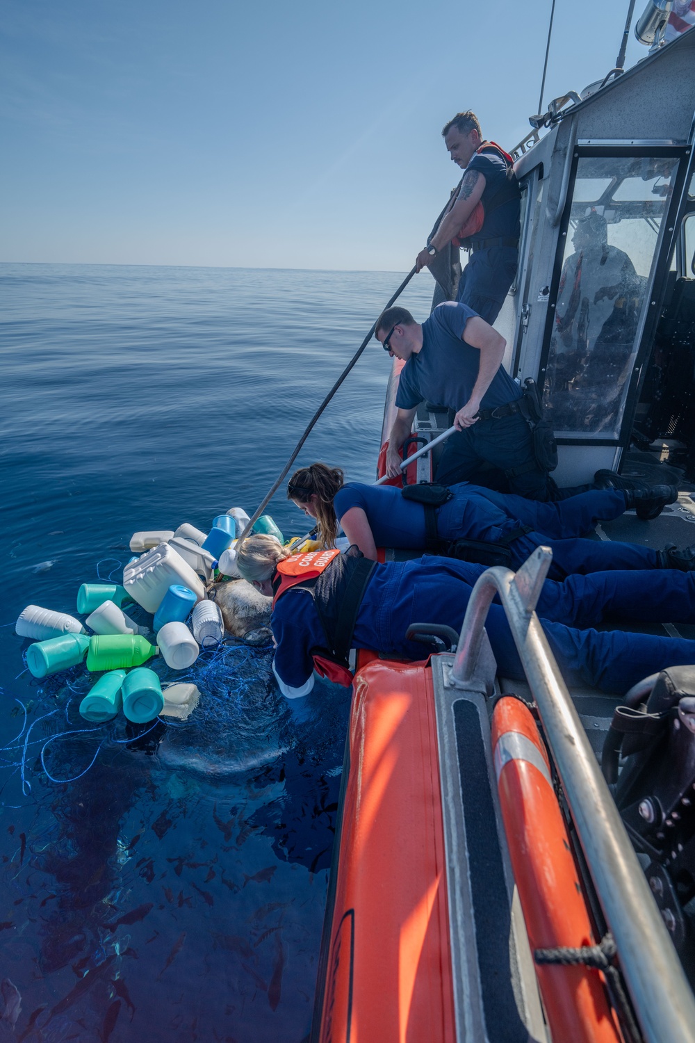 U.S. Coast Guard Cutter Kimball saves marine life, transfers detainees, and stops for fuel in Puerto Quetzal, Guatemala