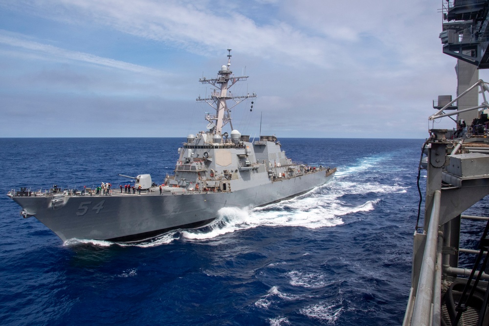 The USS Curtis D. Wilbur Approaches the USS Nimitz for a Refueling-at-Sea