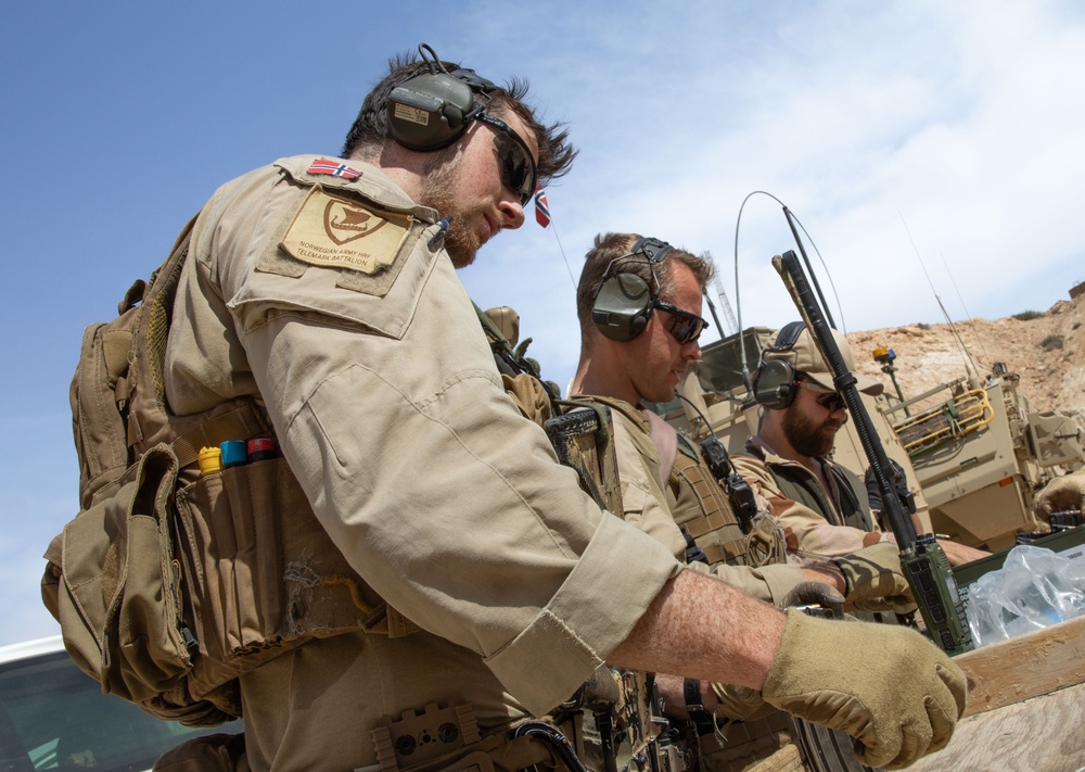Coalition Members Conduct Weapons Training at Al Asad Air Base
