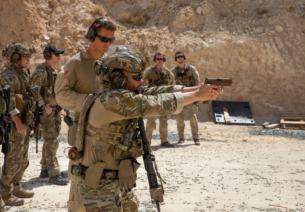 Coalition Members Conduct Weapons Training at Al Asad Air Base