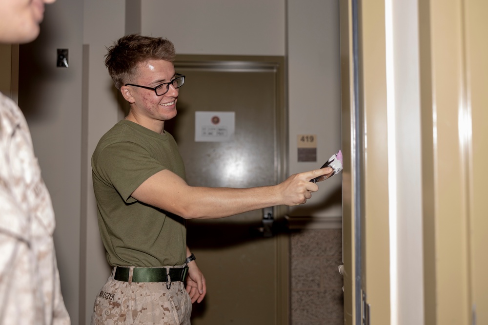 Marines repair barracks walls as part of Operation Clean Sweep-II