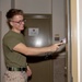 Marines repair barracks walls as part of Operation Clean Sweep-II