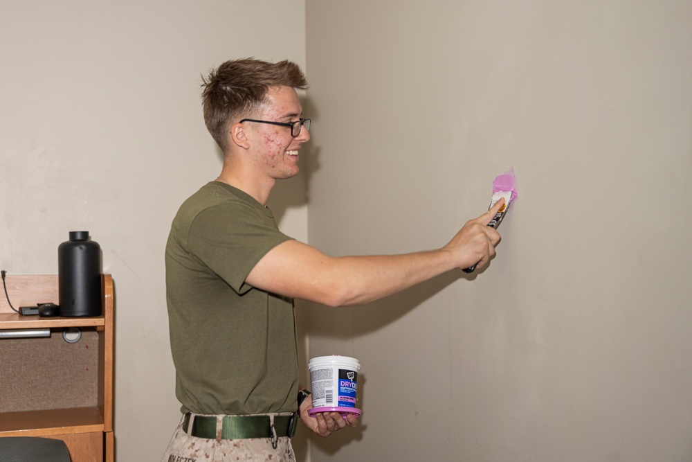 Marines repair barracks walls as part of Operation Clean Sweep-II
