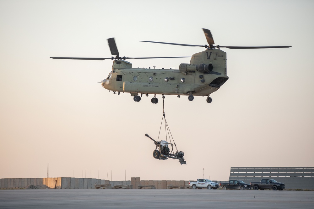 U.S. Troops Conduct Howitzer Airlift