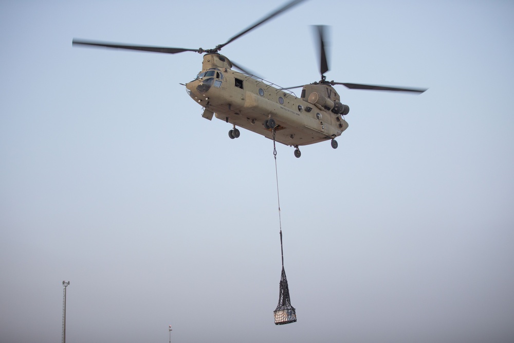 U.S. Troops Conduct Howitzer Airlift