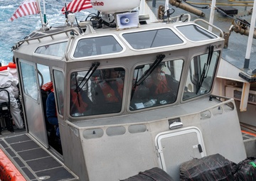U.S. Coast Guard Cutter Kimball conducts at-sea transfer with U.S. Coast Guard Cutter Forward