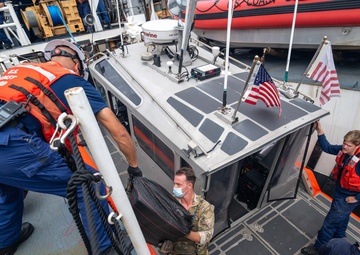U.S. Coast Guard Cutter Kimball conducts at-sea transfer with U.S. Coast Guard Cutter Forward