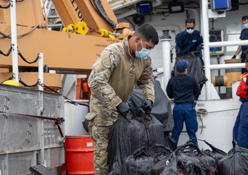 U.S. Coast Guard Cutter Kimball conducts at-sea transfer with U.S. Coast Guard Cutter Forward