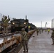 U.S. Soldiers offload approximately Stryker armored vehicles