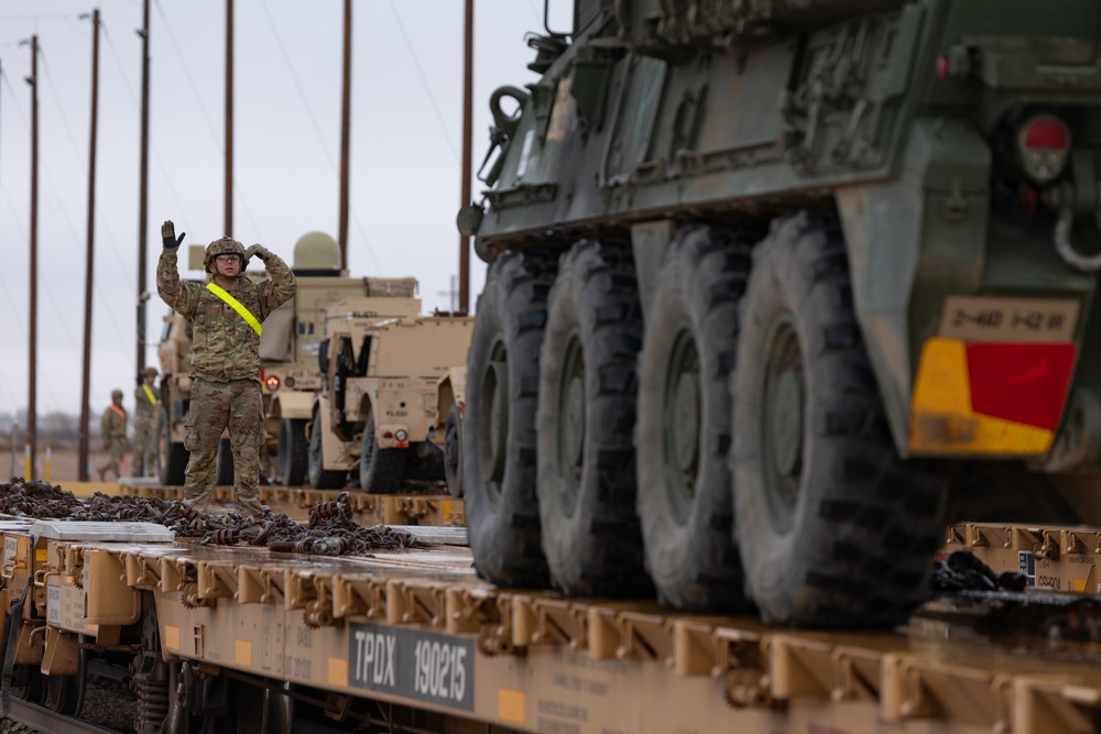 U.S. Soldiers offload approximately Stryker armored vehicles