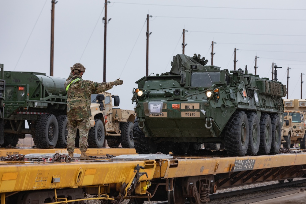 U.S. Soldiers offload approximately Stryker armored vehicles