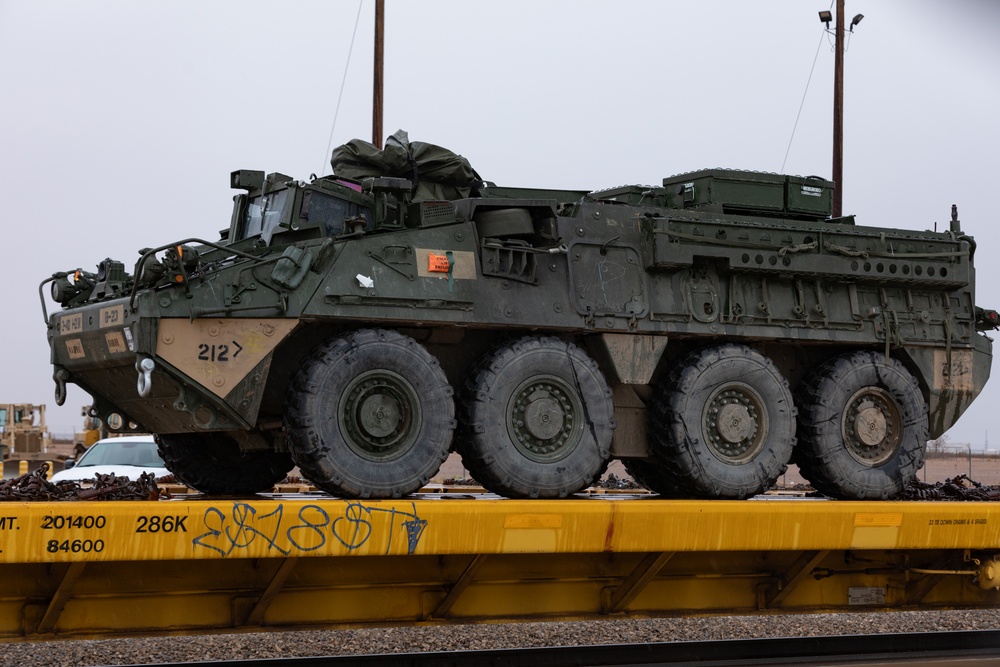 U.S. Soldiers offload approximately Stryker armored vehicles
