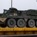 U.S. Soldiers offload approximately Stryker armored vehicles
