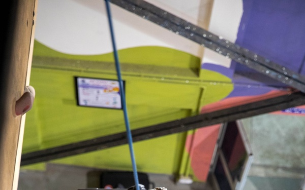 U.S. and Indian Soldiers climb rock wall during Tiger Triumph