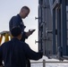 Fire Controlmen onboard USS Iwo Jima perform maintenance on NATO Sea Sparrow