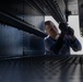 Fire Controlmen onboard USS Iwo Jima perform maintenance on NATO Sea Sparrow